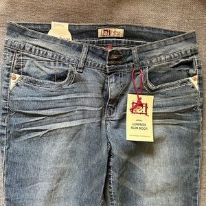 New with tags l.e.i.  Junior Ashley Lowrise Slim Boot Jeans size 11